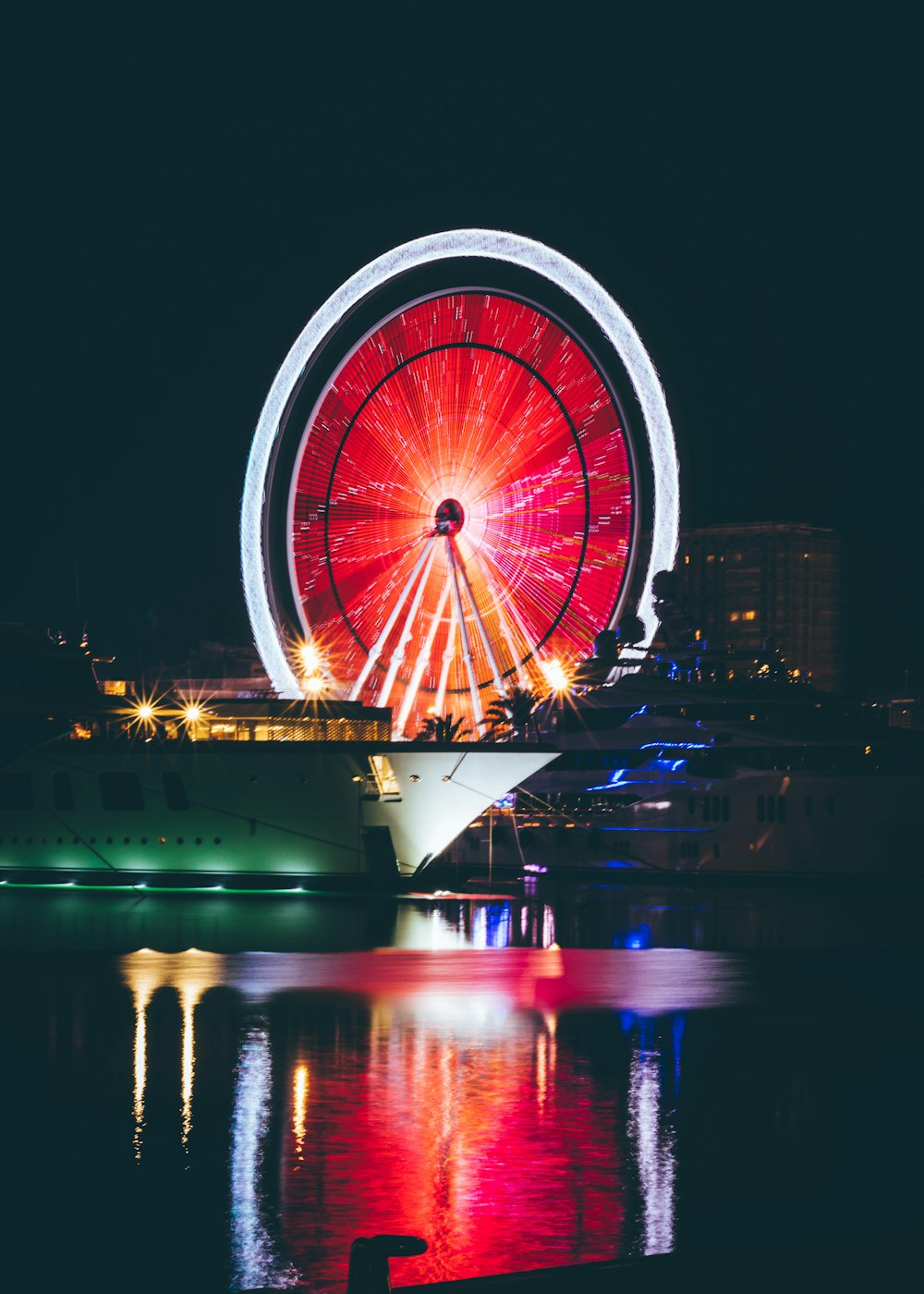ferris wheel with lights at nighttime