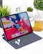 turned-on black tablet computer with keyboard