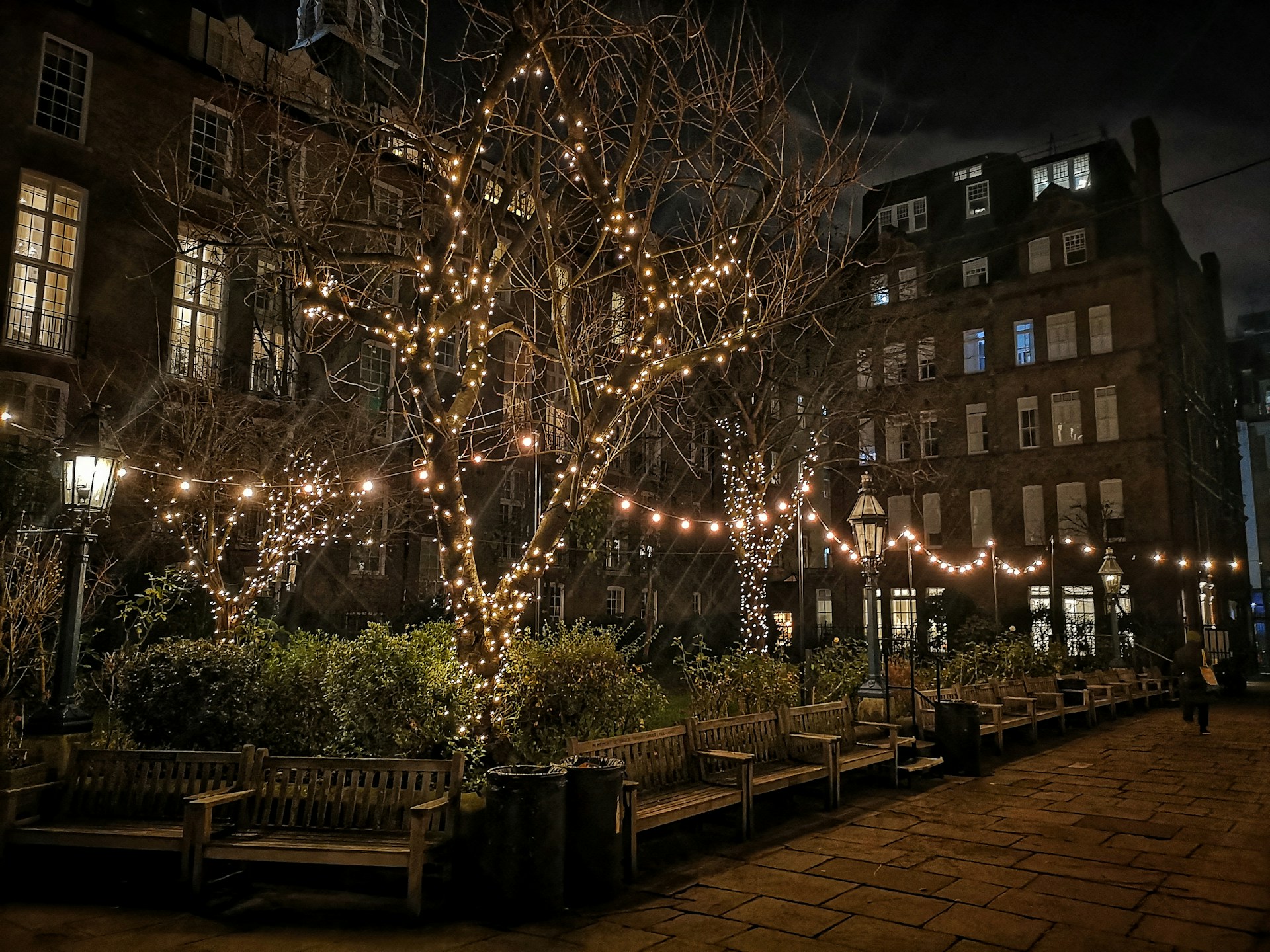 woman wearing yellow long-sleeved dress under white clouds and blue sky during daytime