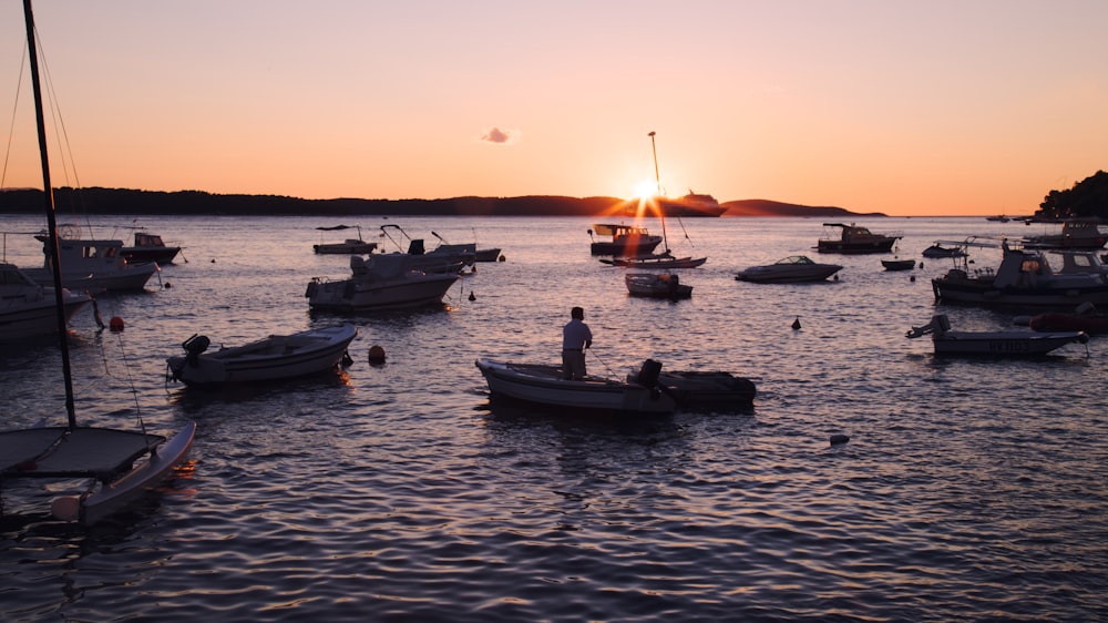 boat in body of water during golden hour