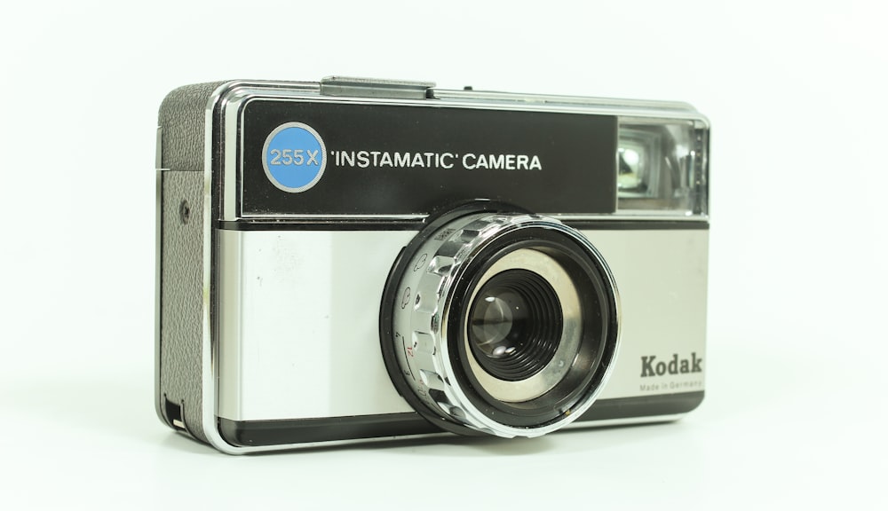 gray and black Kodak Instamatic camera