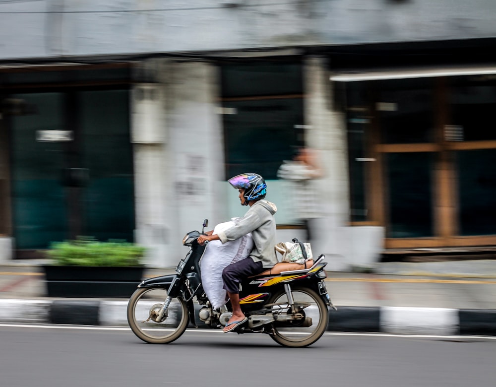 time lapse man driving motorcycle