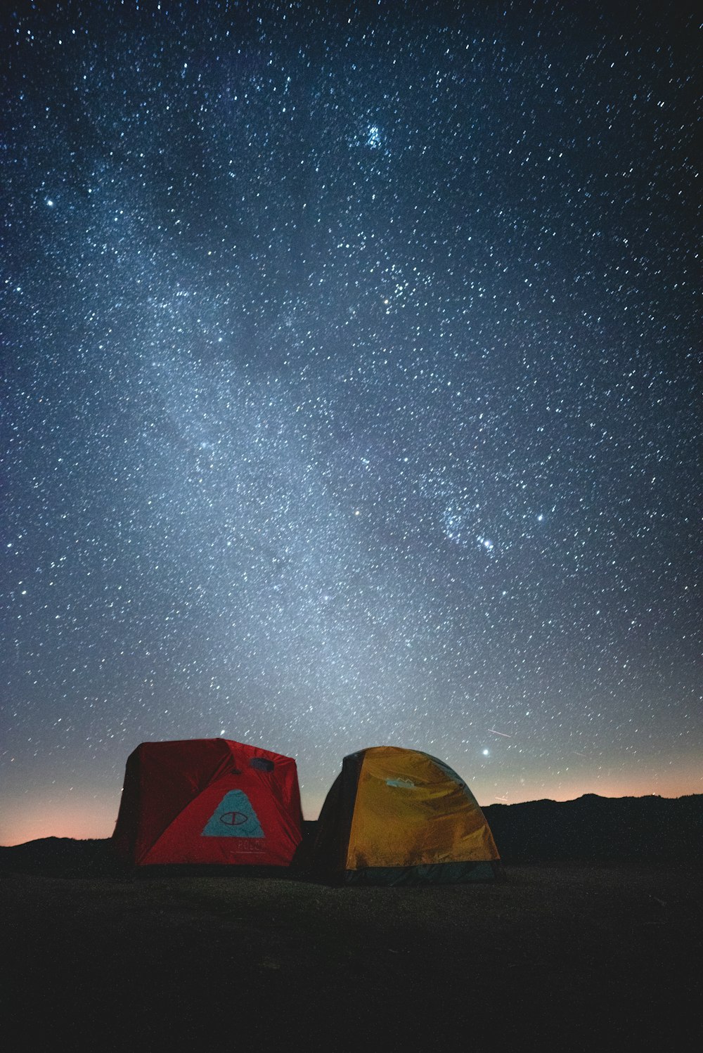 two red and yellow tents