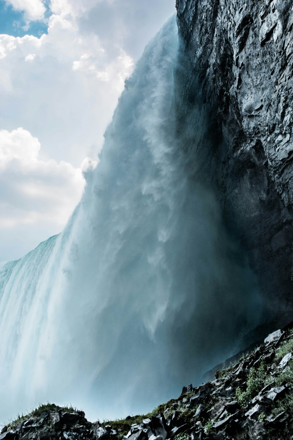 low-angle photography waterfall during daytime