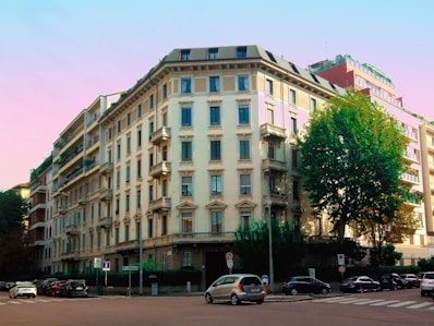 Elegant residential apartment building with balconies overlooking a London street.