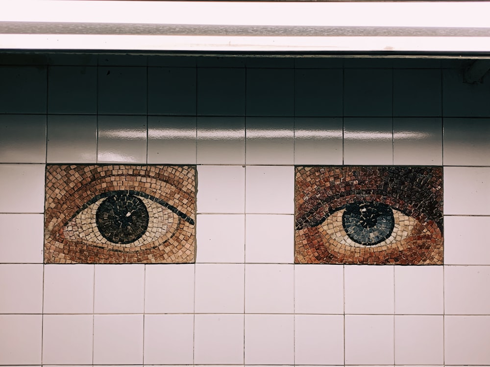 pair of eye mosaic tile decors