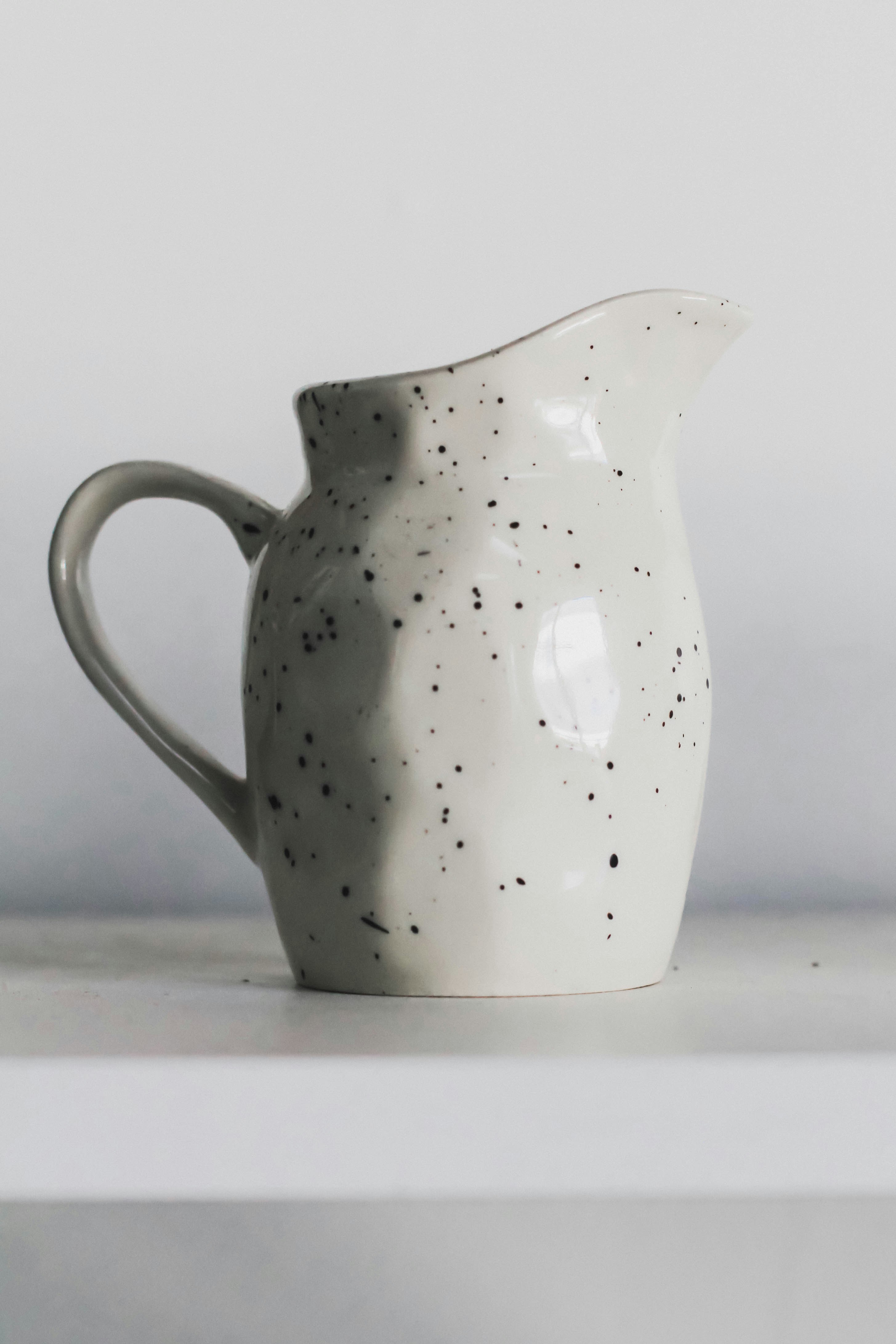 white ceramic pitcher