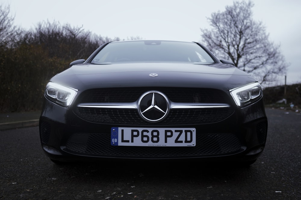 black Mercedes-Benz car