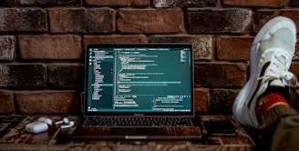 gray laptop computer turned-on