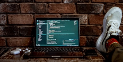 gray laptop computer turned-on