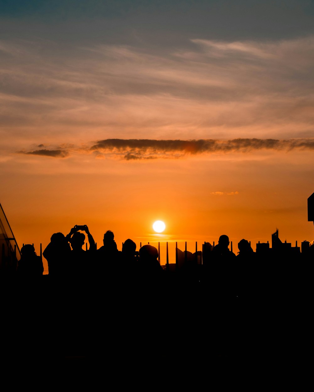 silhouette of people during golden hour