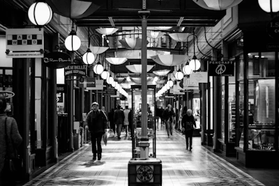 A small photo gallery showing local shops and happy customers enjoying their savings.