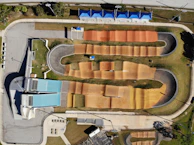 A panoramic view of the newly built Ruckstrack BMX track with riders in action.