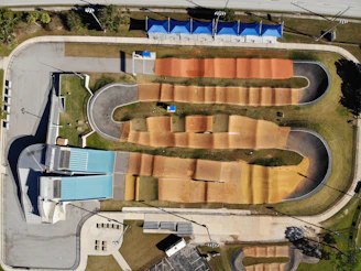 A panoramic view of the newly built Ruckstrack BMX track with riders in action.
