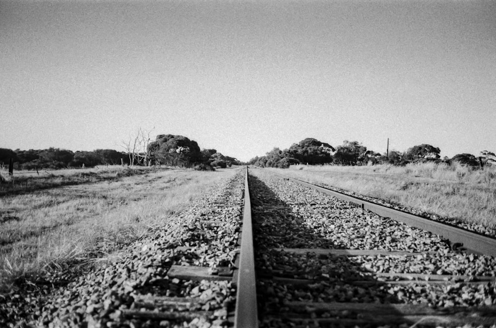 grayscale photo of train railway