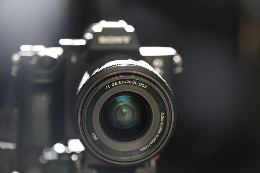 black Sony DSLR camera selective focus photography