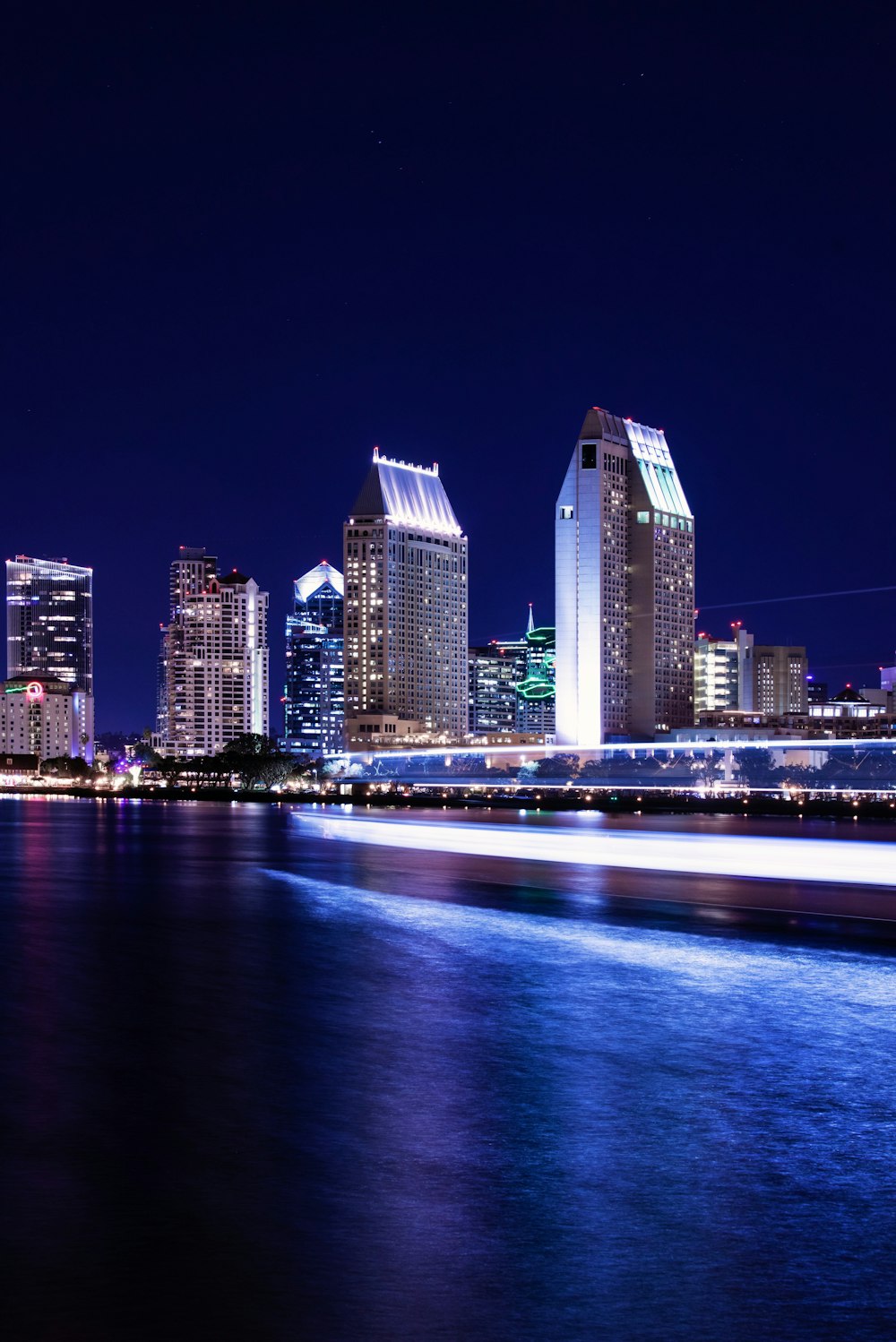 high rise building near body of water during daytime