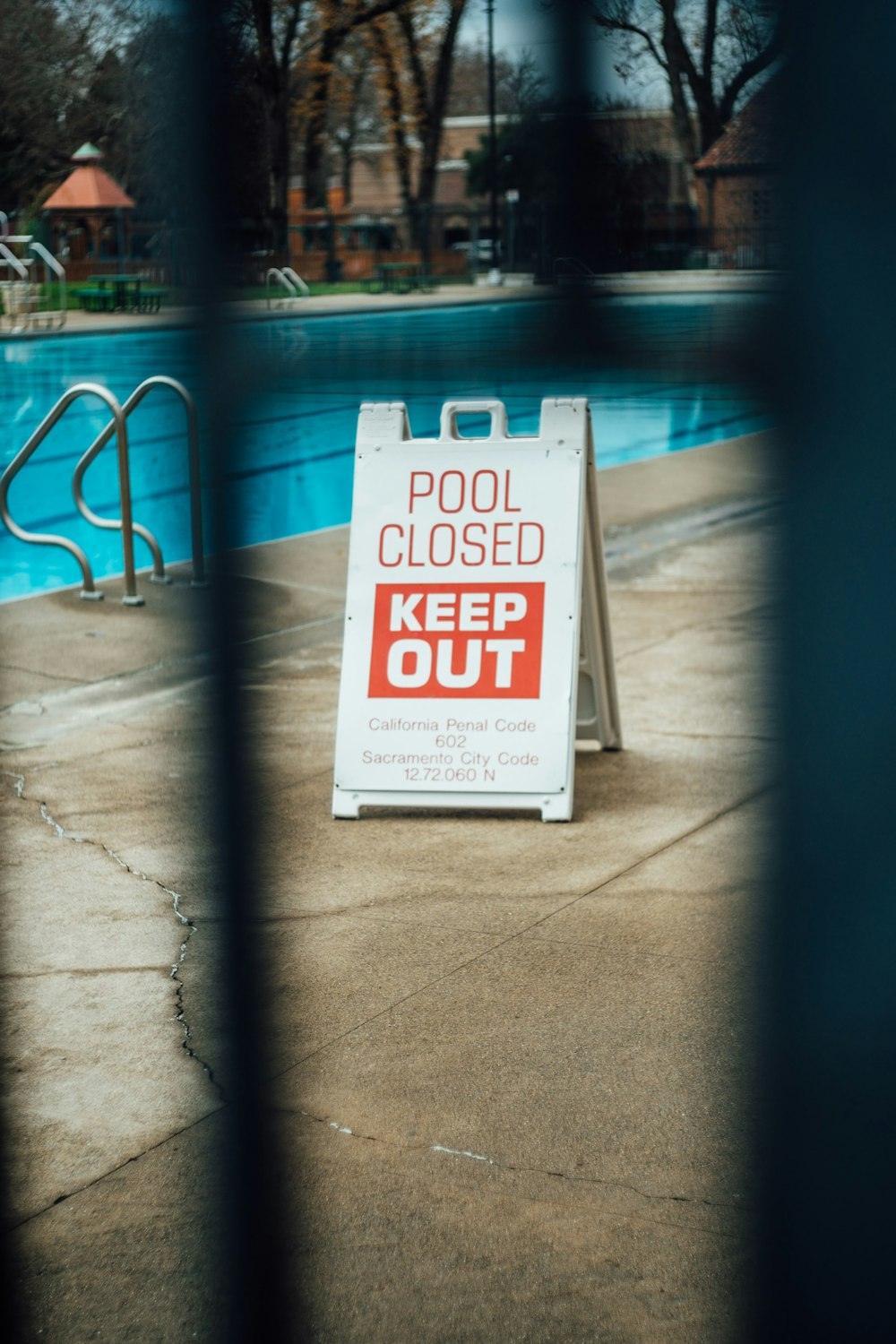 pool closed keep out signage near pool