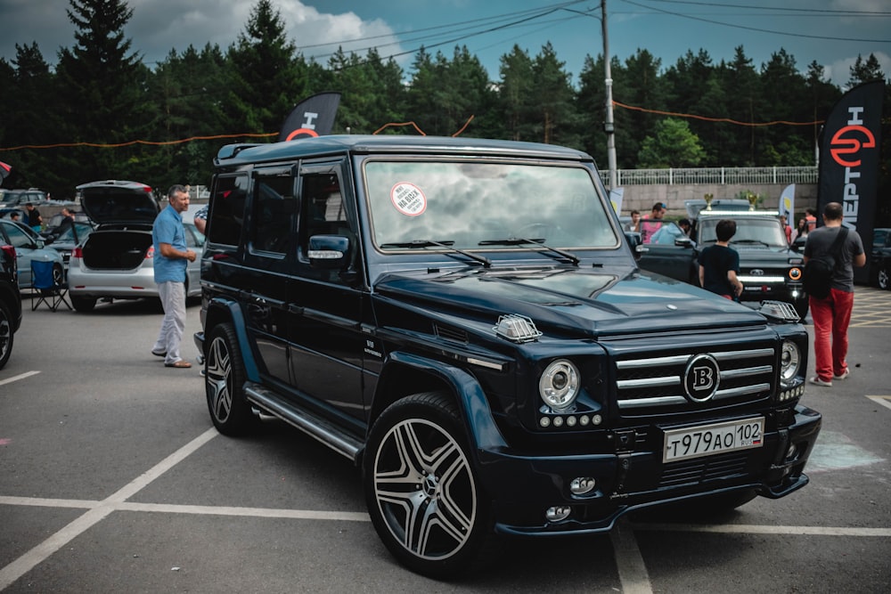 blue off-road vehicle on parking lot