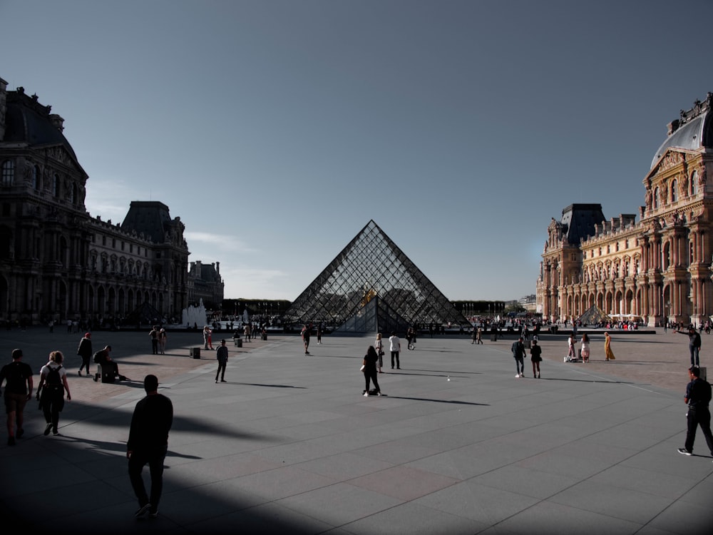 people walking near Louvre museum