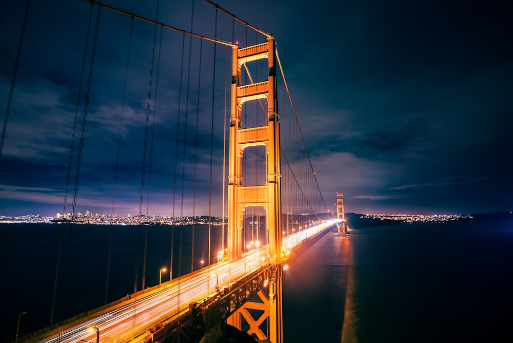 lighted Golden Gate Bridge during night