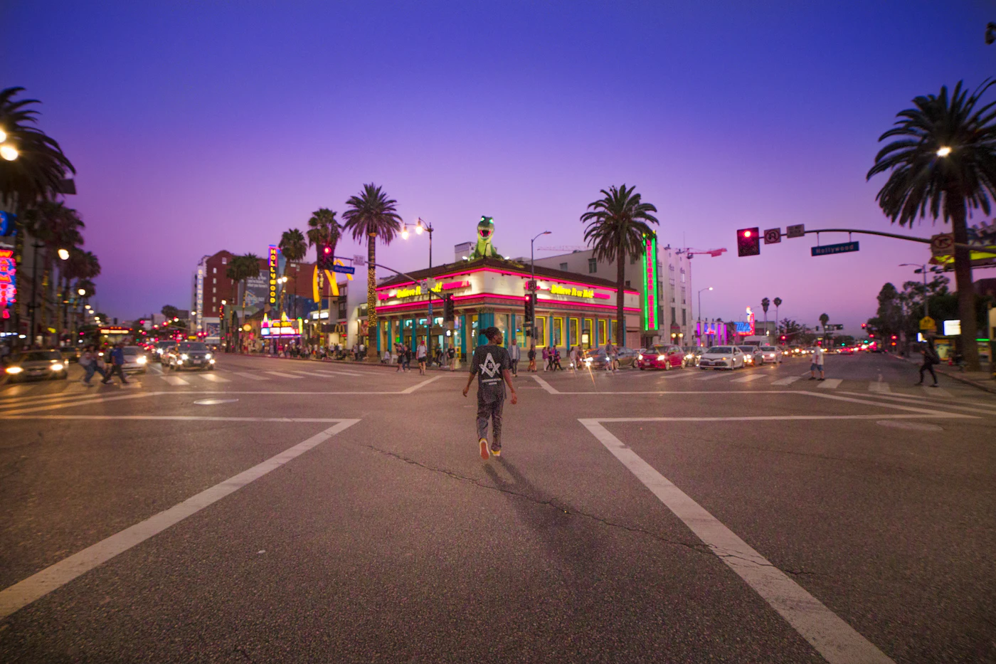 A busy Hollywood street at night