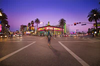 A busy Hollywood street at night