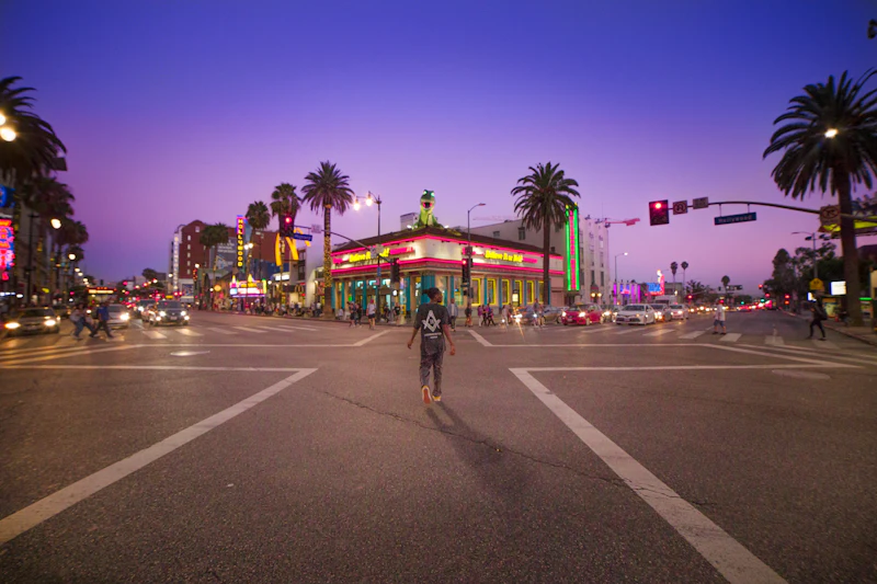 A busy Hollywood street at night