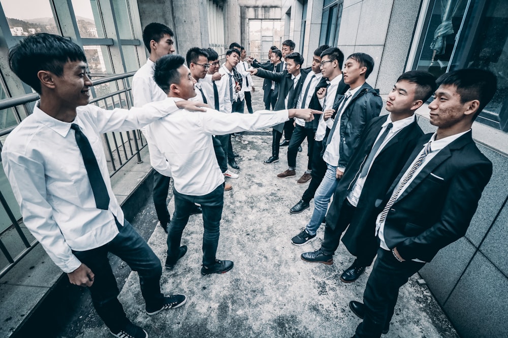 group of man gathering inside room