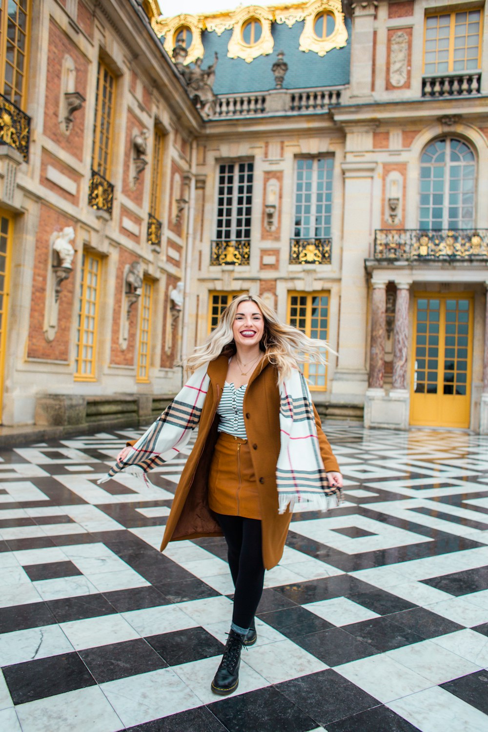 woman standing in the middle of the building