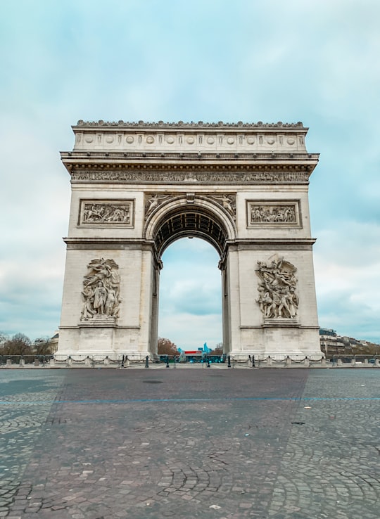 Arc de Triomphe during daytime in Arc de Triomphe France