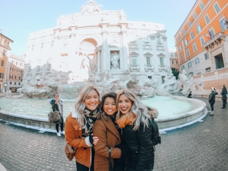 Happy travelers enjoying their trip at a famous landmark.