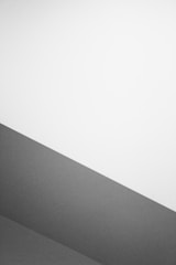 A minimalistic black and white abstract painting.