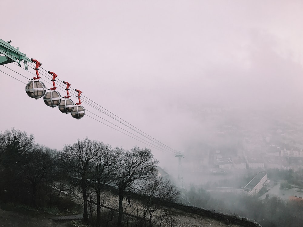 cable car surrounded with fog