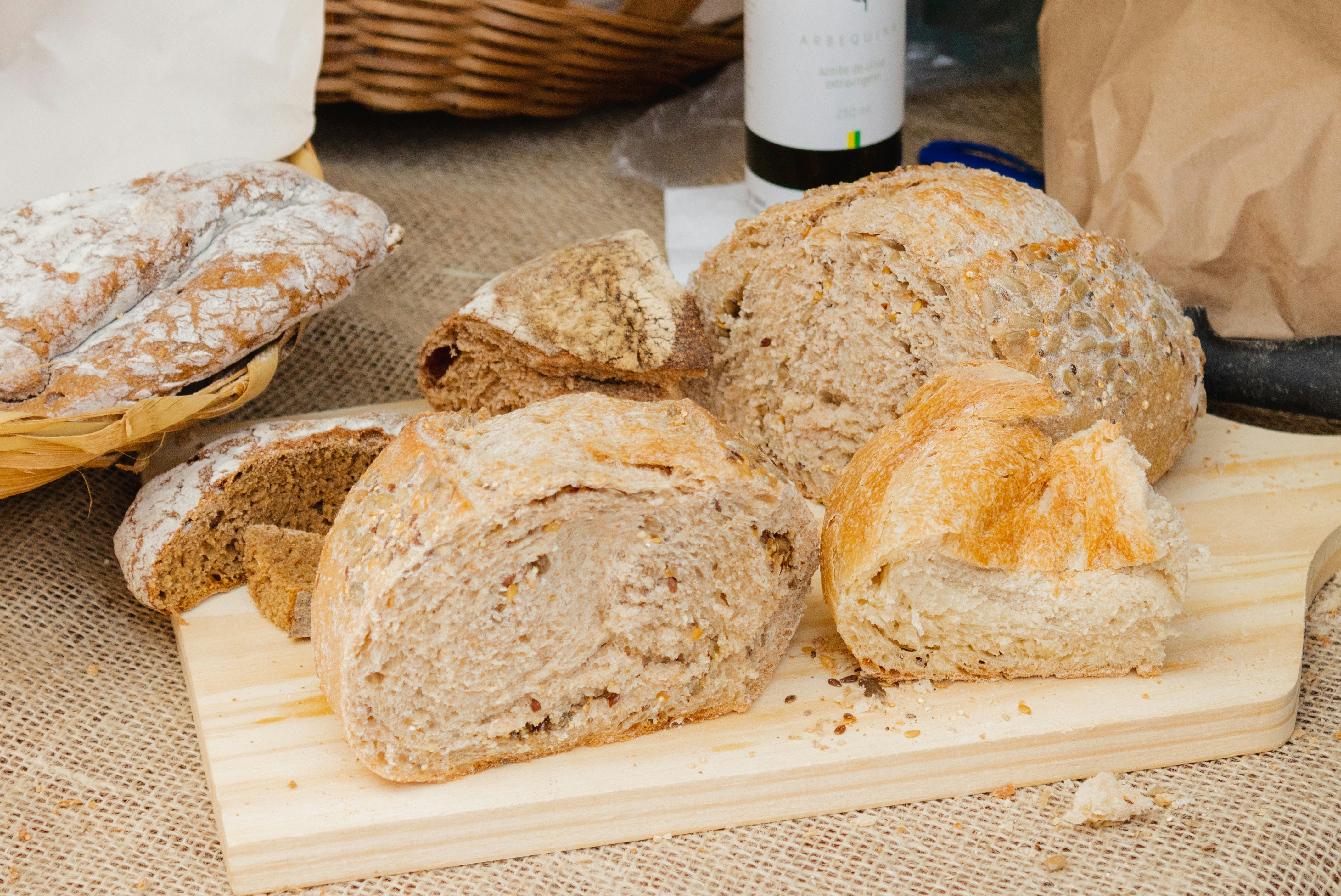 baked bread on wooden board