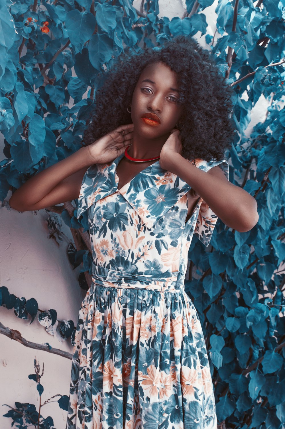 woman standing near tree