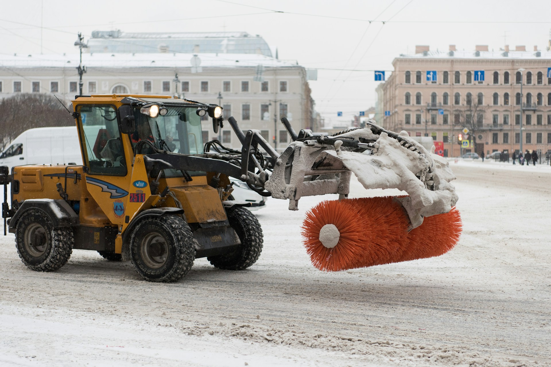 yellow heavy equipment on road during daytime