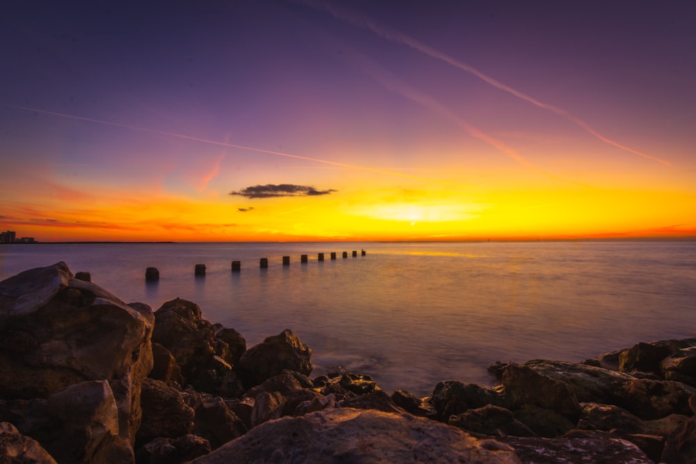 body of water at golden hour