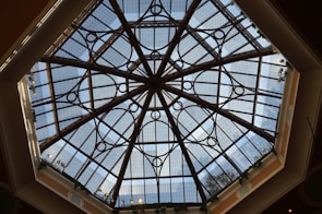 Close-up of a skylight installation on a commercial building, showcasing precise craftsmanship.
