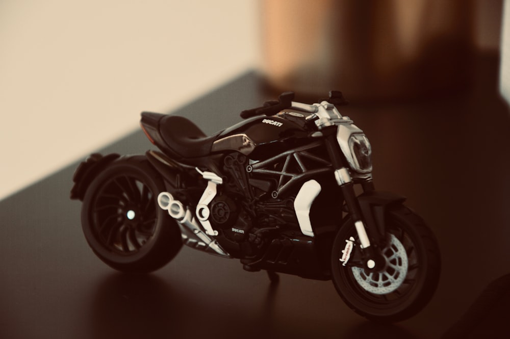 white and black motorcycle toy