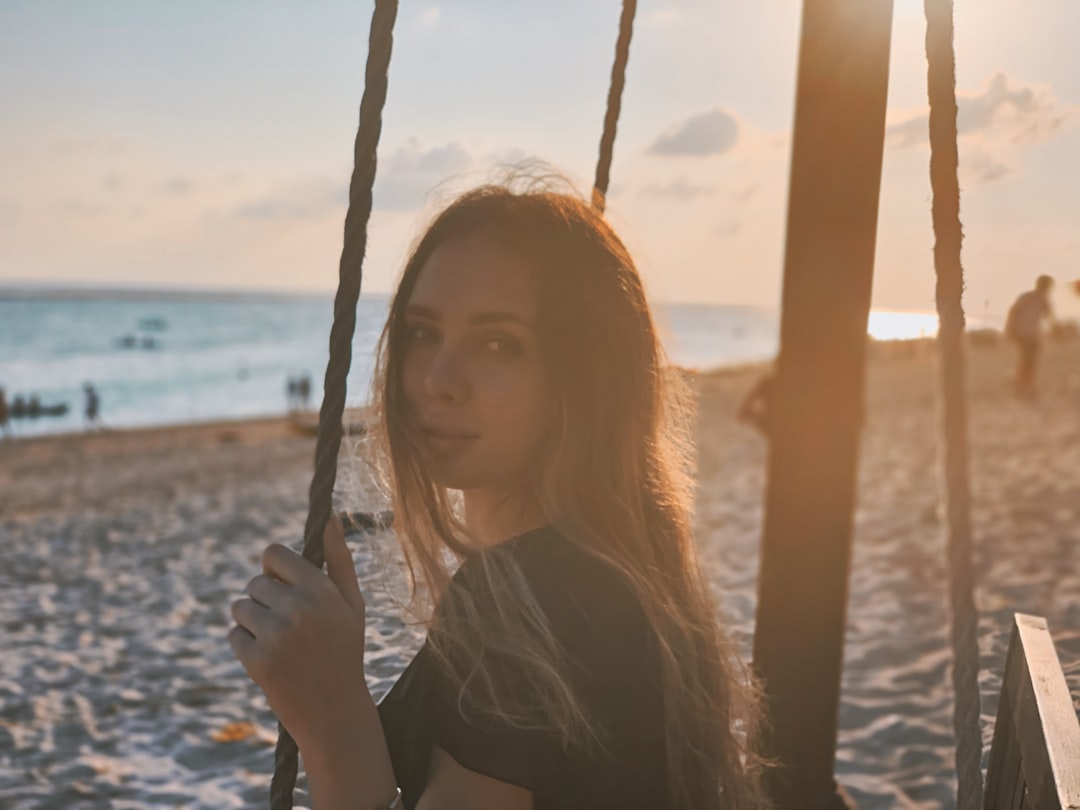 women's black crew-neck top close-up photography