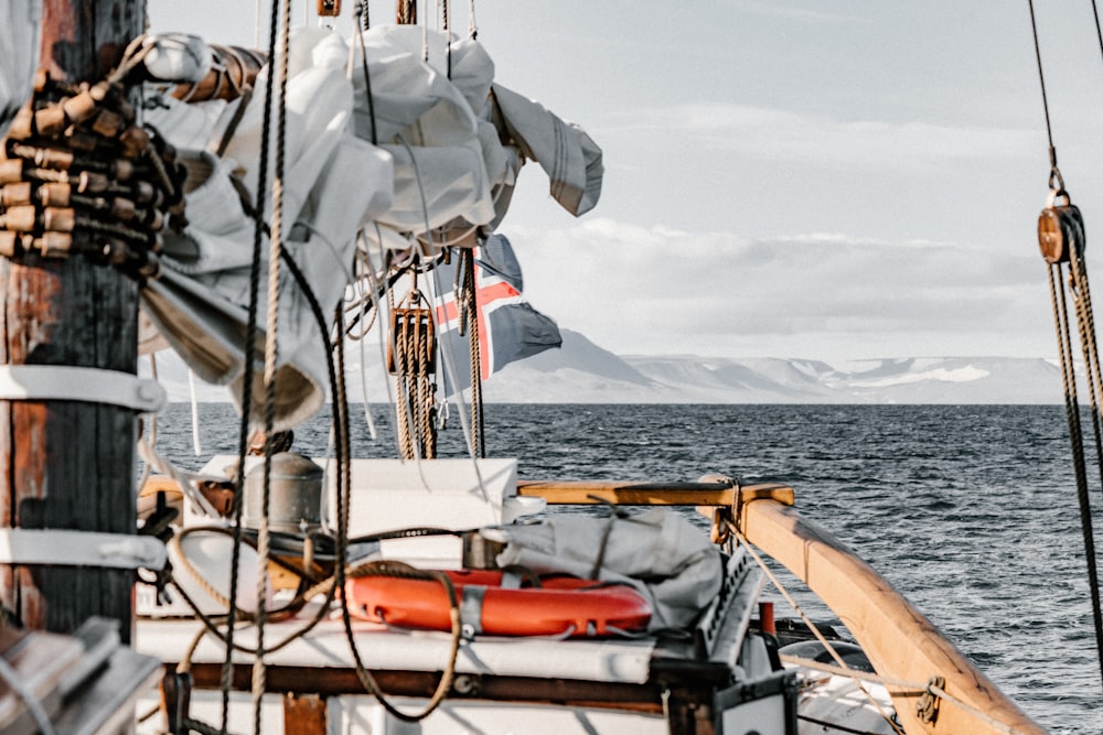 brown boat on ocean during daytime