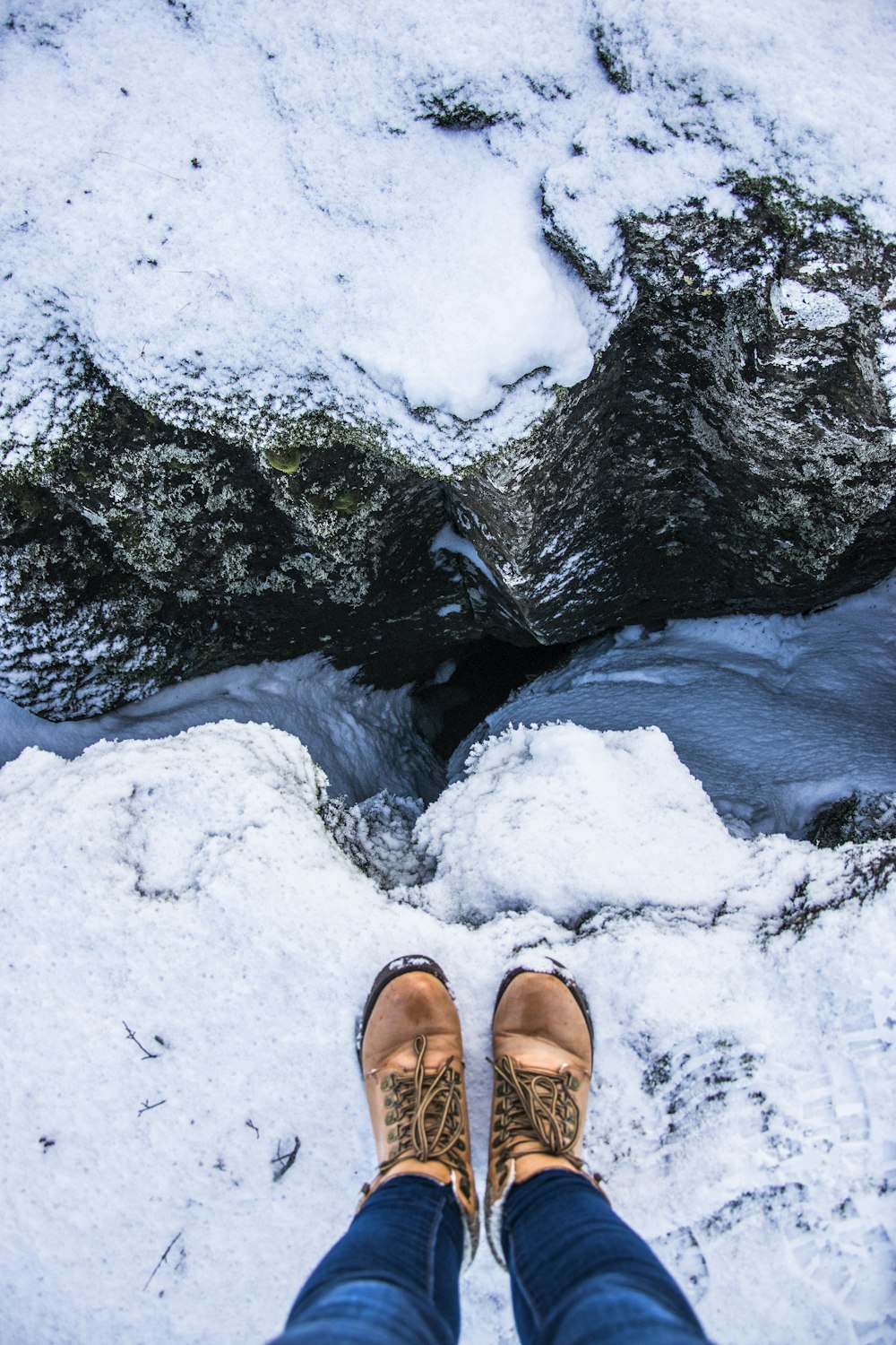 person standing on the edge of a cliff