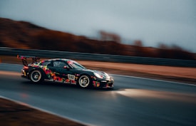 time lapse photography of car on road