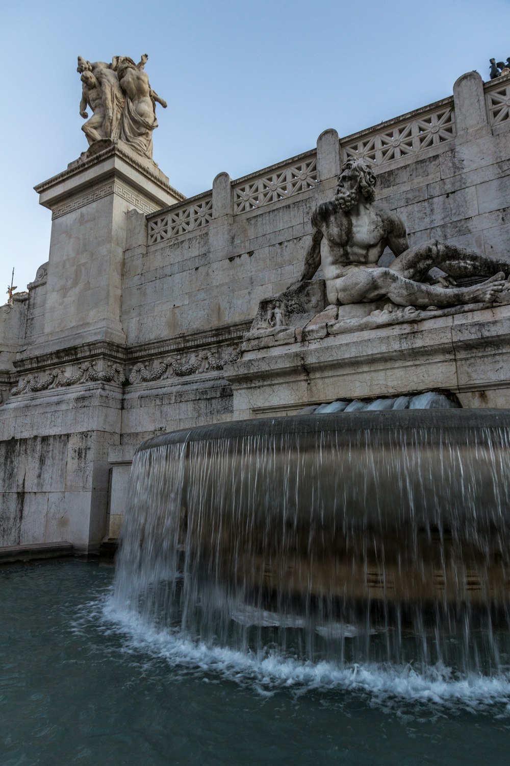 concrete framed fountain under blue sky