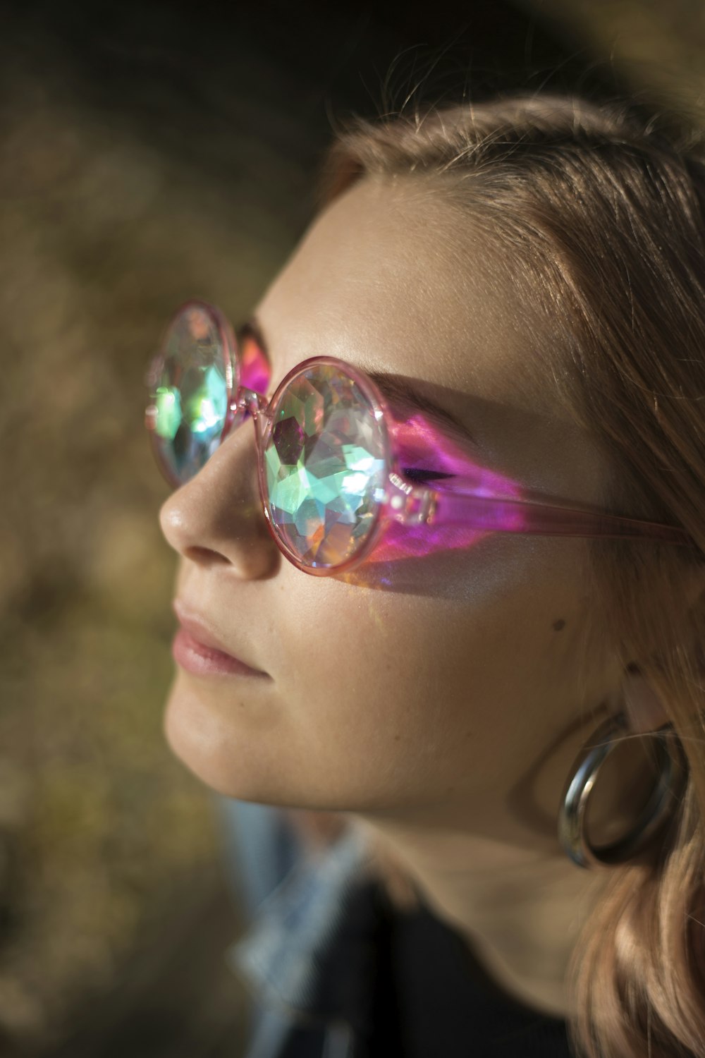 woman wearing pink framed eyeglasses