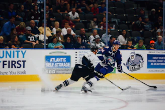 two ice hockey player on field