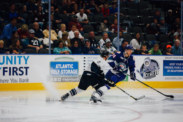 two ice hockey player on field