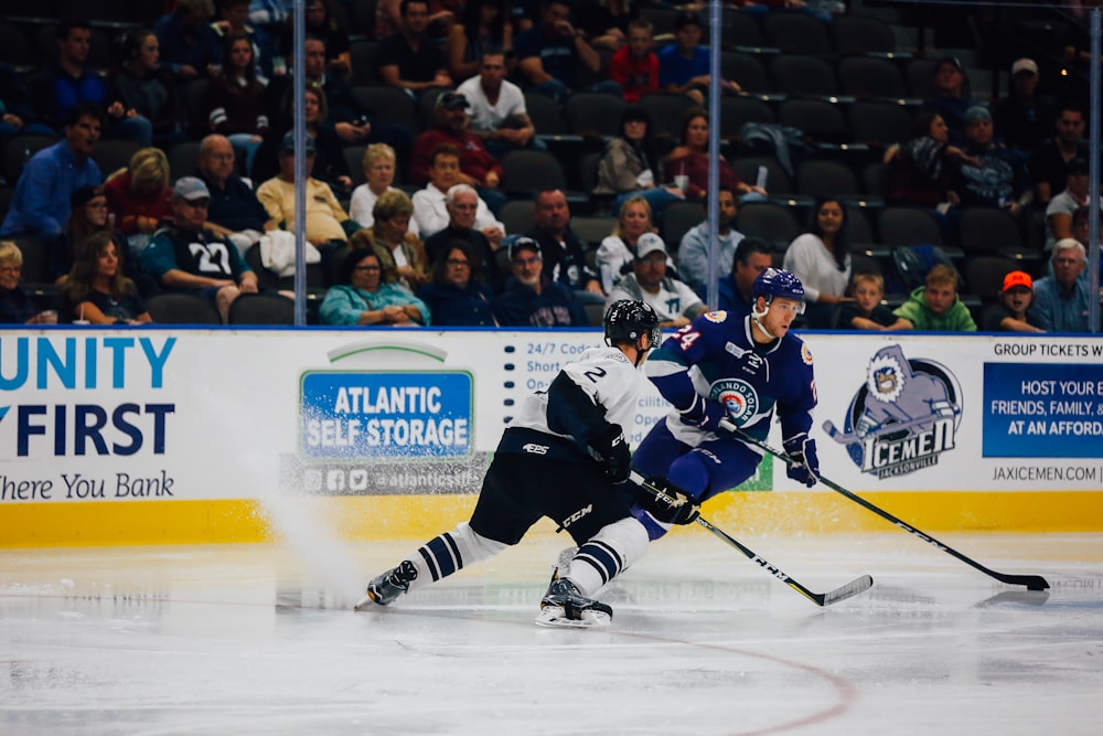 two ice hockey player on field