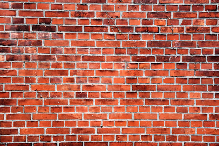 Clean brown brick wall of a house exterior